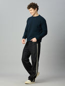 Model wearing The Lofa men's raw black baggy denim jeans with double side stripes for a premium streetwear look