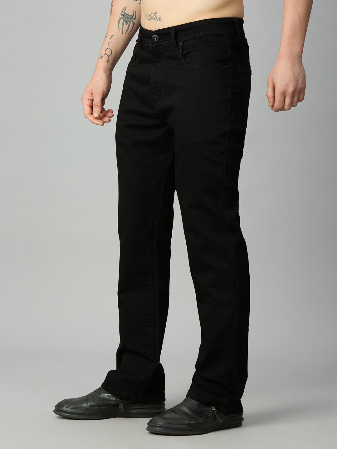 Men's pitch black straight fit stretch denim jeans with a clean classic silhouette – right side view