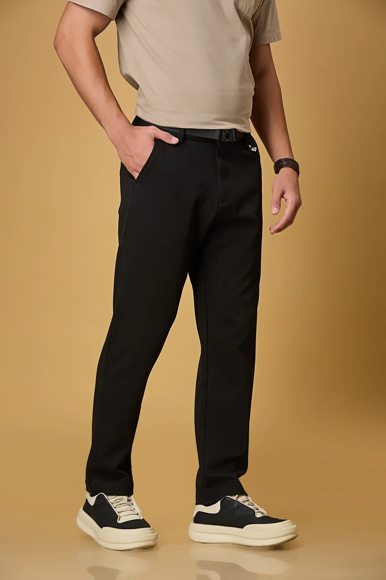 Side view of Black straight fit formal trousers for men – LOFA stretchable Tencel cotton spandex blend with belt detail.