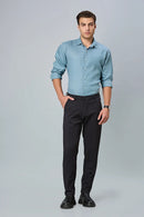 Model wearing LOFA men’s formal stretchable trousers – timeless design and perfect fit for work or smart occasions.
