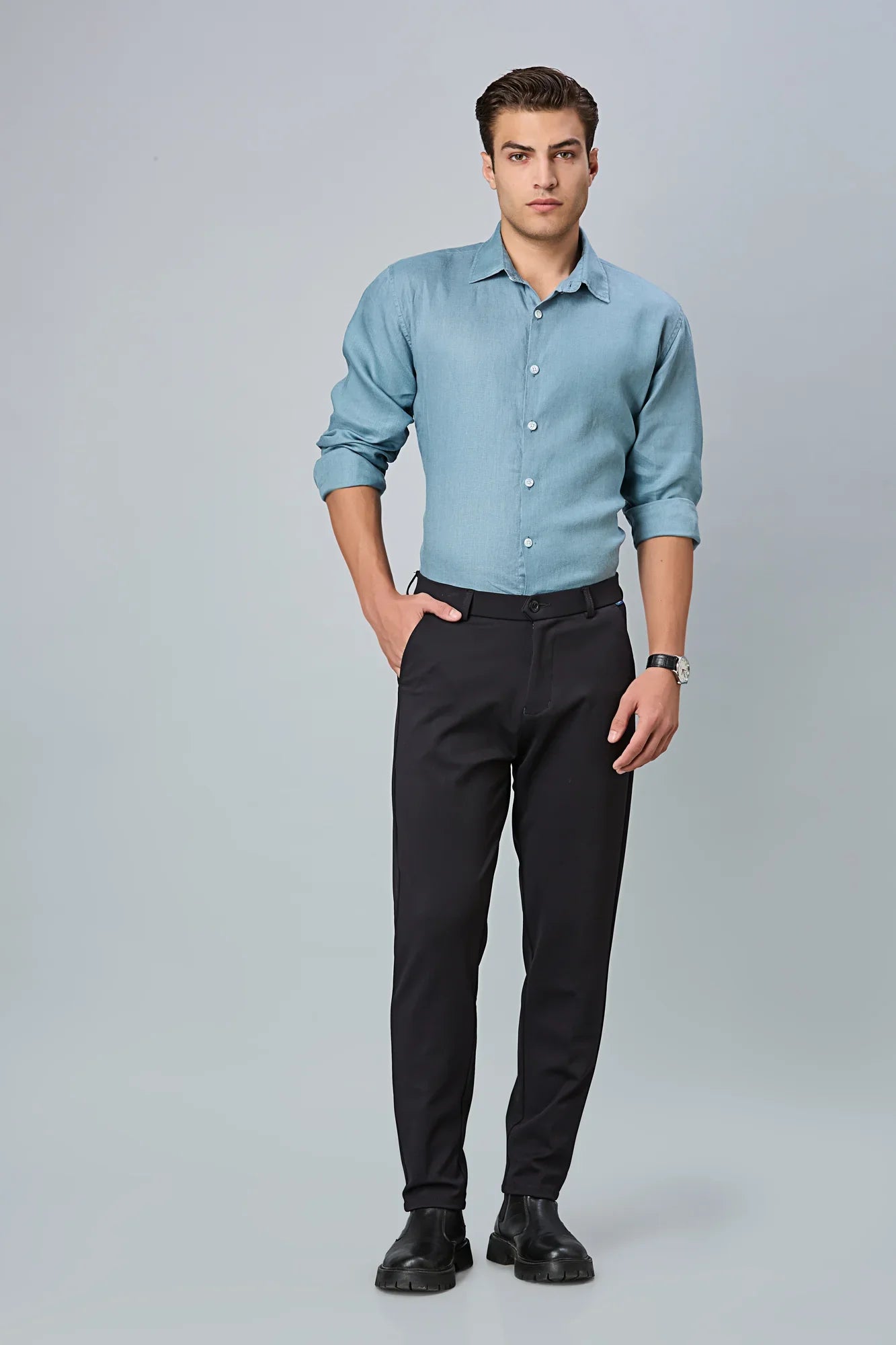Model wearing LOFA men’s formal stretchable trousers – timeless design and perfect fit for work or smart occasions.