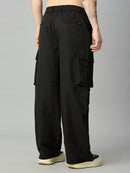 Black wide-leg cargo pants with an elastic waistband, shown from the back on a model against a neutral gray background.