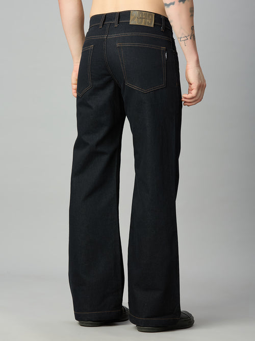 Men's deep blue bootcut jeans featuring classic back pockets and premium denim – back view