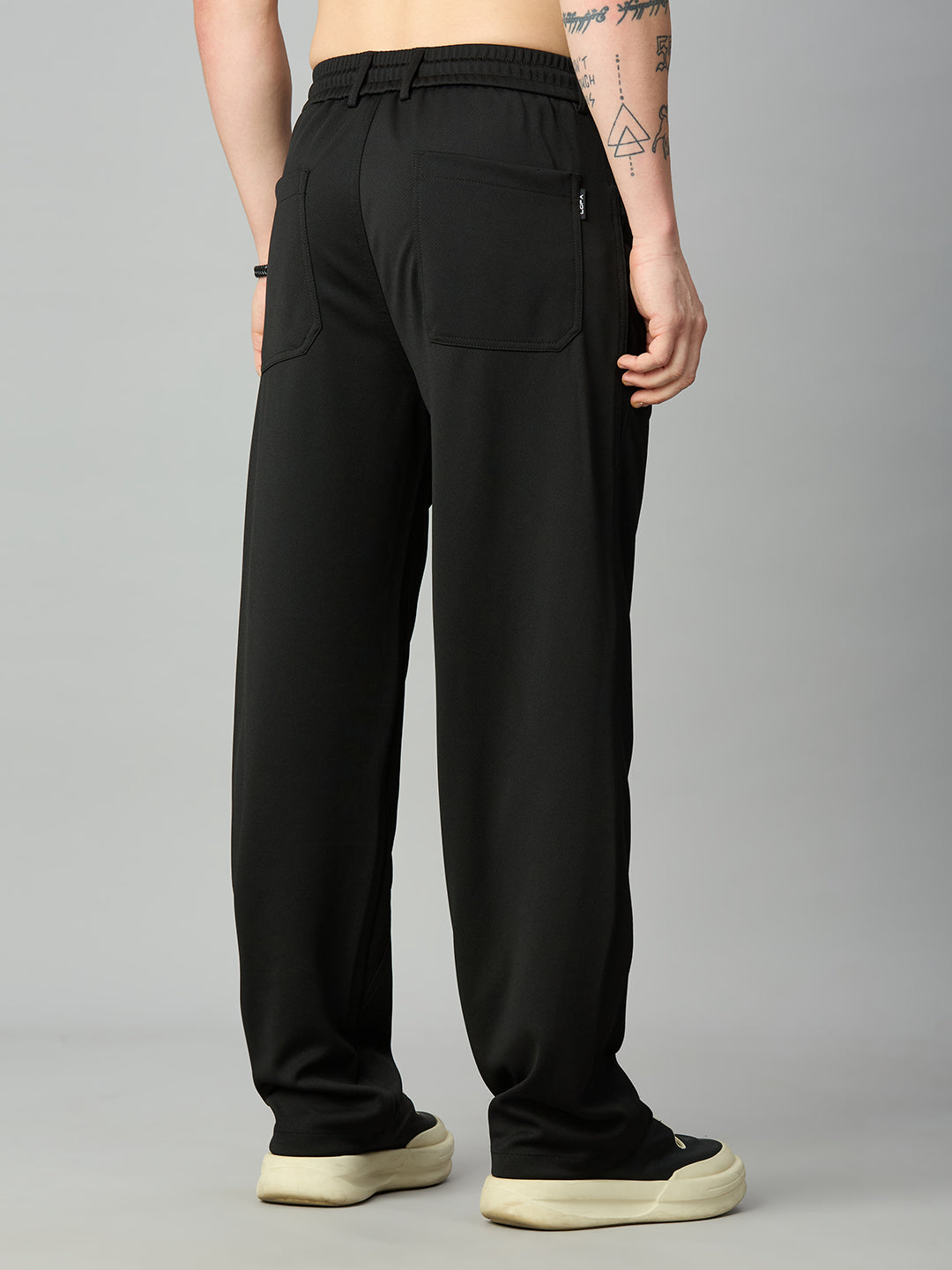 Rear view of Lofa™ Relaxed Fit Tencel Stretch Drawstring Pants displaying clean back pockets, elastic waistband, and relaxed straight-leg design.