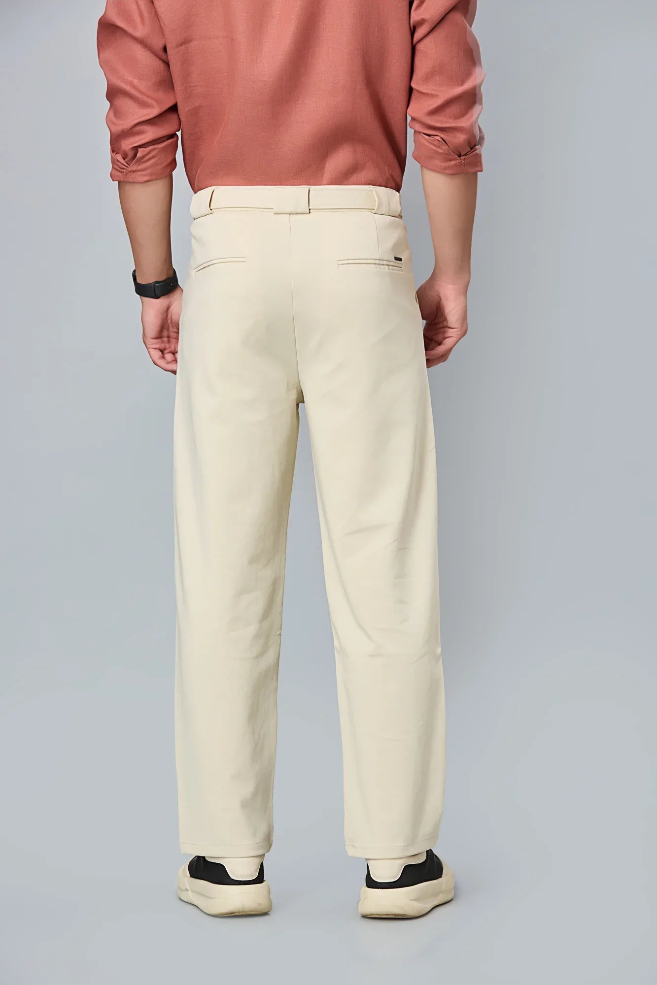 Back design of men’s formal trousers with tailored fit and stretchable fabric
