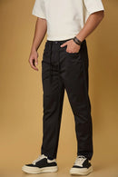 black stretchable trousers side view showing casual comfort fit.