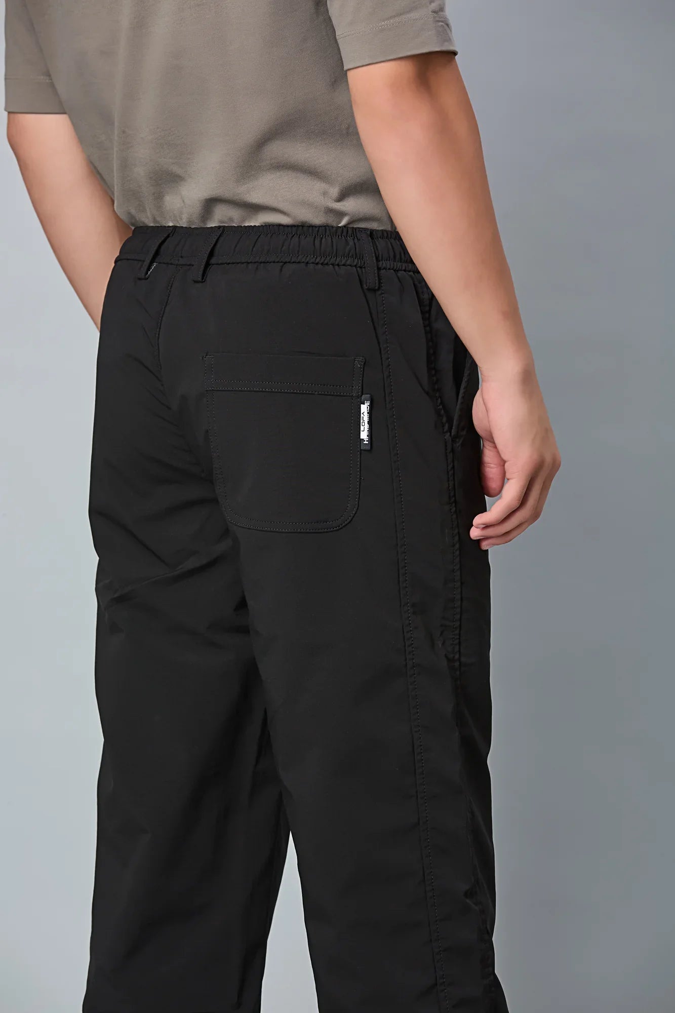 Black View of LOFA Men’s Cream Polyester Comfort Fit Trousers – Casual Stretch Pants