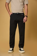 Front view of LOFA men’s Black straight fit trousers with built-in belt – stretchable Tencel cotton blend fabric.