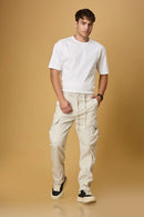 LOFA beige cargo pants styled for men – casual and versatile everyday look.