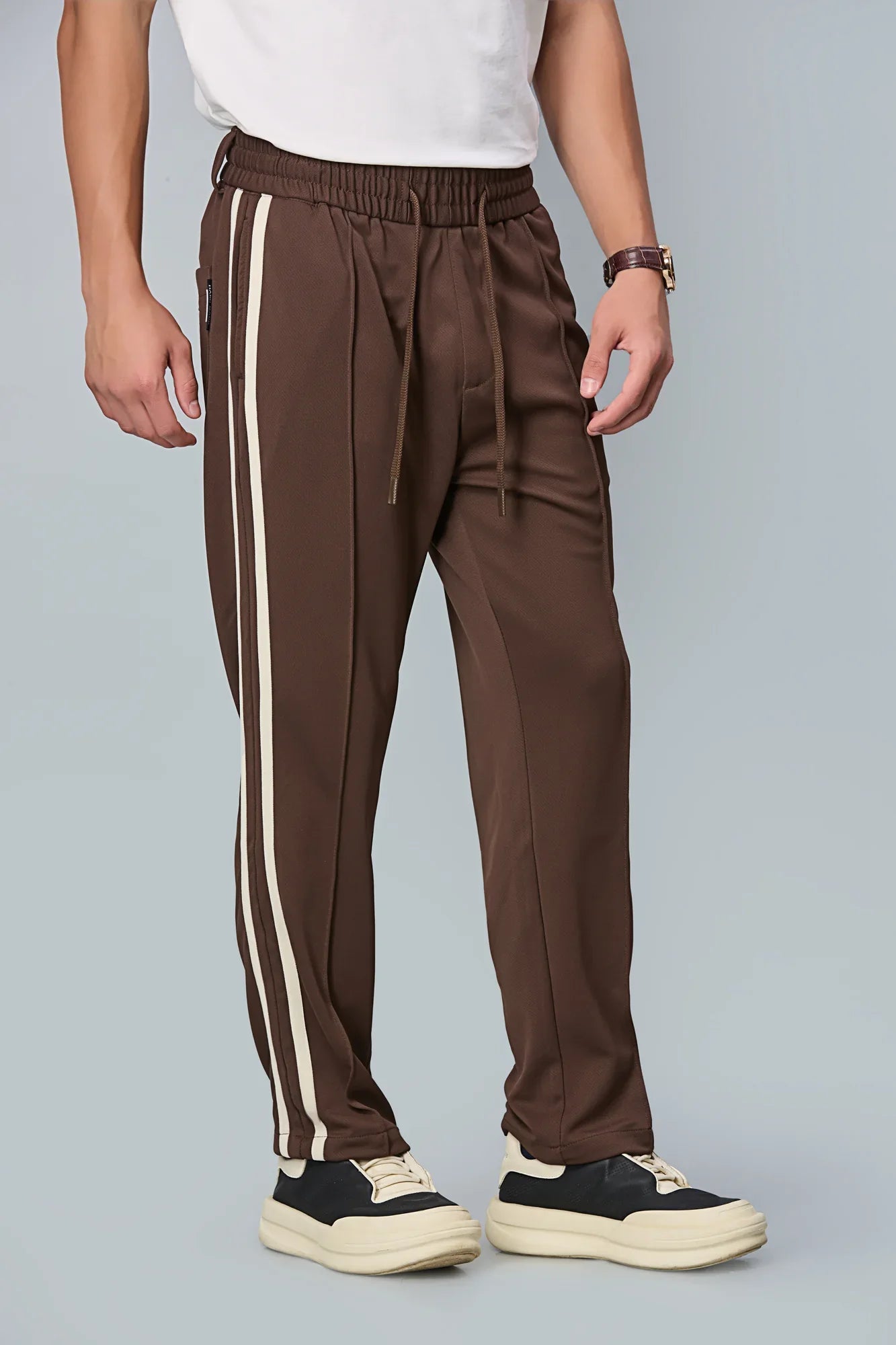 Side view of men’s Coffee Brown straight-fit active trousers – LOFA lightweight stretchable pants for casual and active wear.