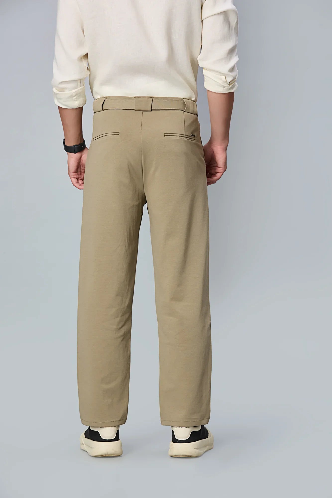 Back design of men’s trousers with tailored fit and stretchable fabric back view 