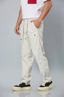 Side View of LOFA Cream Comfort Fit Trousers with Waist String