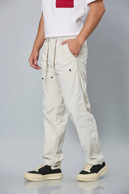 Side View of LOFA Cream Comfort Fit Trousers with Waist String