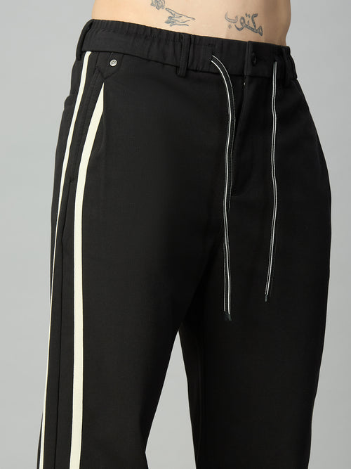 Close-up of contrast side stripe detailing on premium cotton-Tencel smart pants