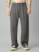 Men's relaxed fit Tencel stretch pants with textured fabric and drawstring waist – front view