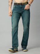 Men's light blue-green straight fit stretch denim jeans with attached adjustable web belt – front view