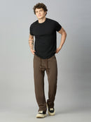 Model wearing Lofa™ relaxed fit Tencel stretch pants styled for everyday comfort and modern casual wear