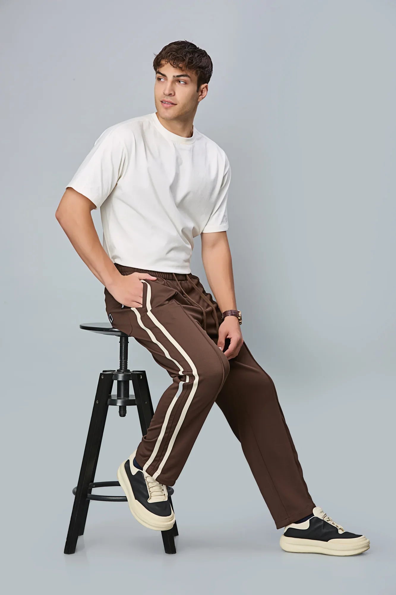 Full outfit look with LOFA men’s Coffee Brown straight-fit active pants – versatile for casual, travel, and everyday comfort.