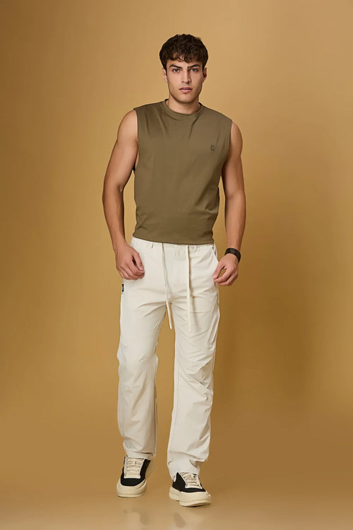 LOFA beige comfort fit trousers styled for men – stretchable and casual look.