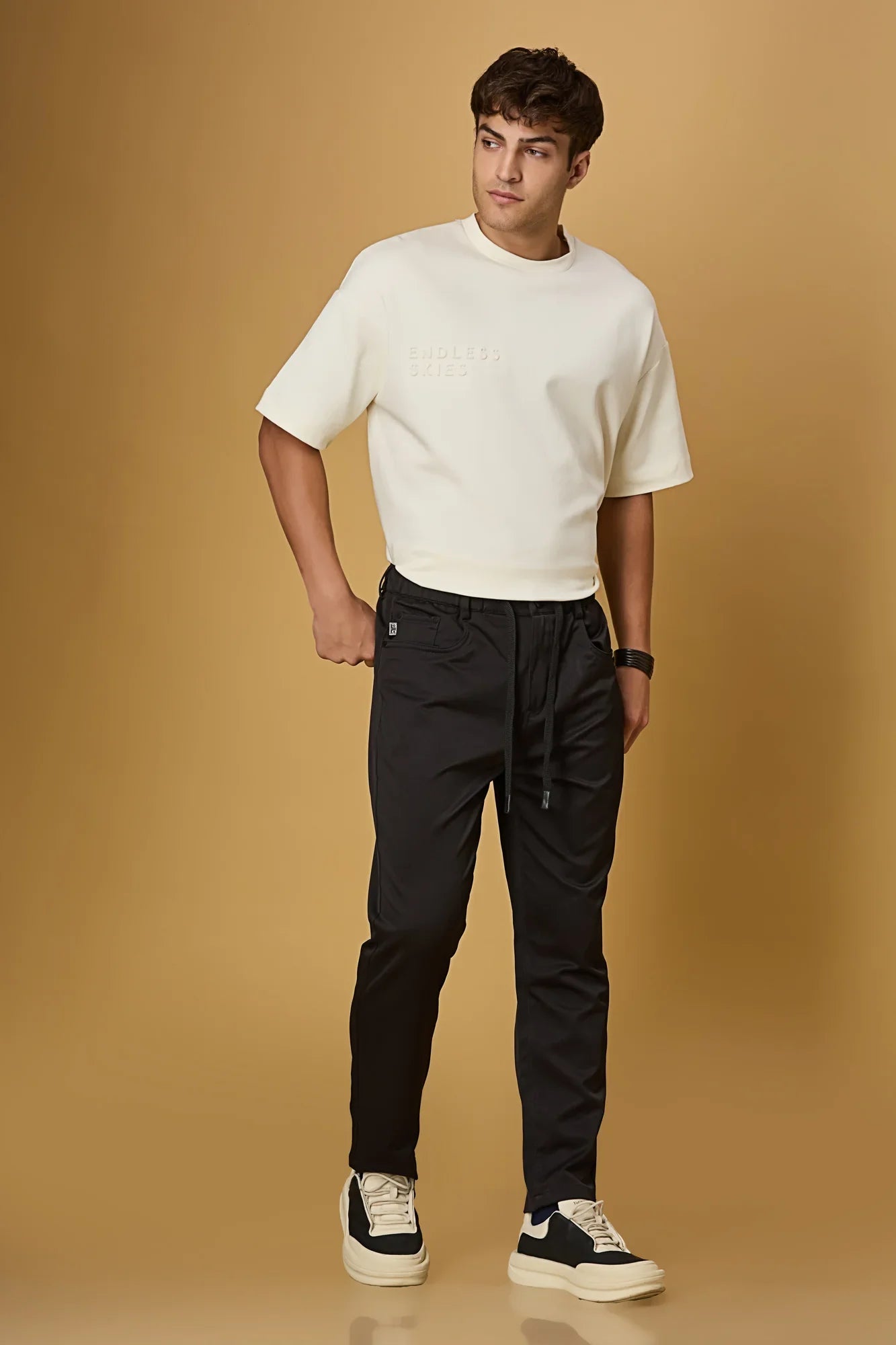 LOFA black comfort fit trousers styled for men – casual and stretchable look.