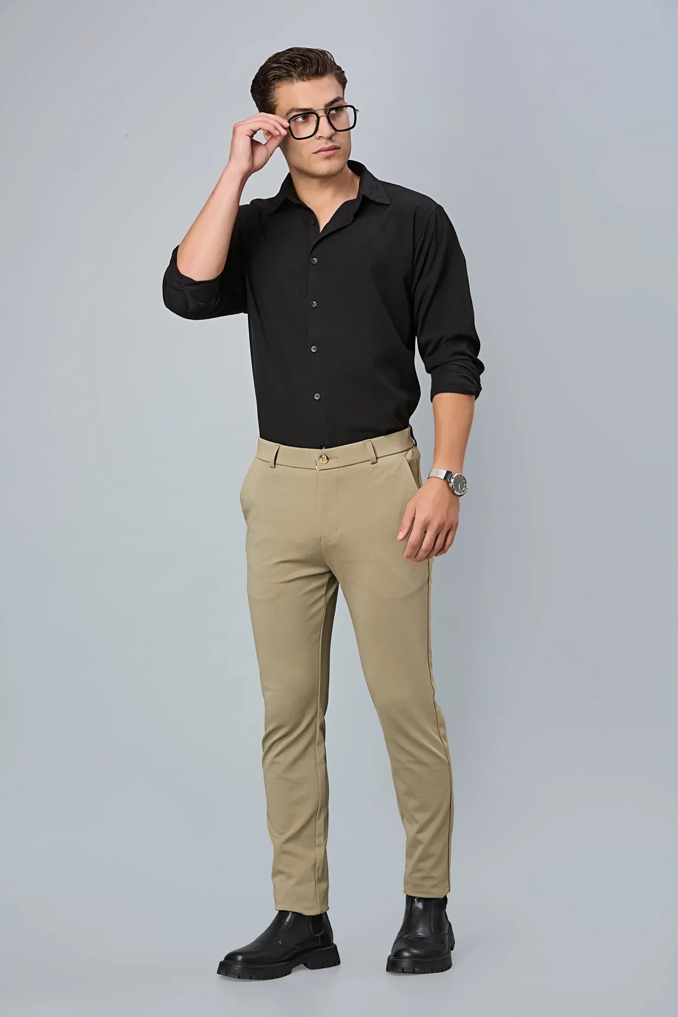 Model wearing LOFA khaki slim fit formal trousers – modern stretch comfort and timeless design for men’s formal wear.