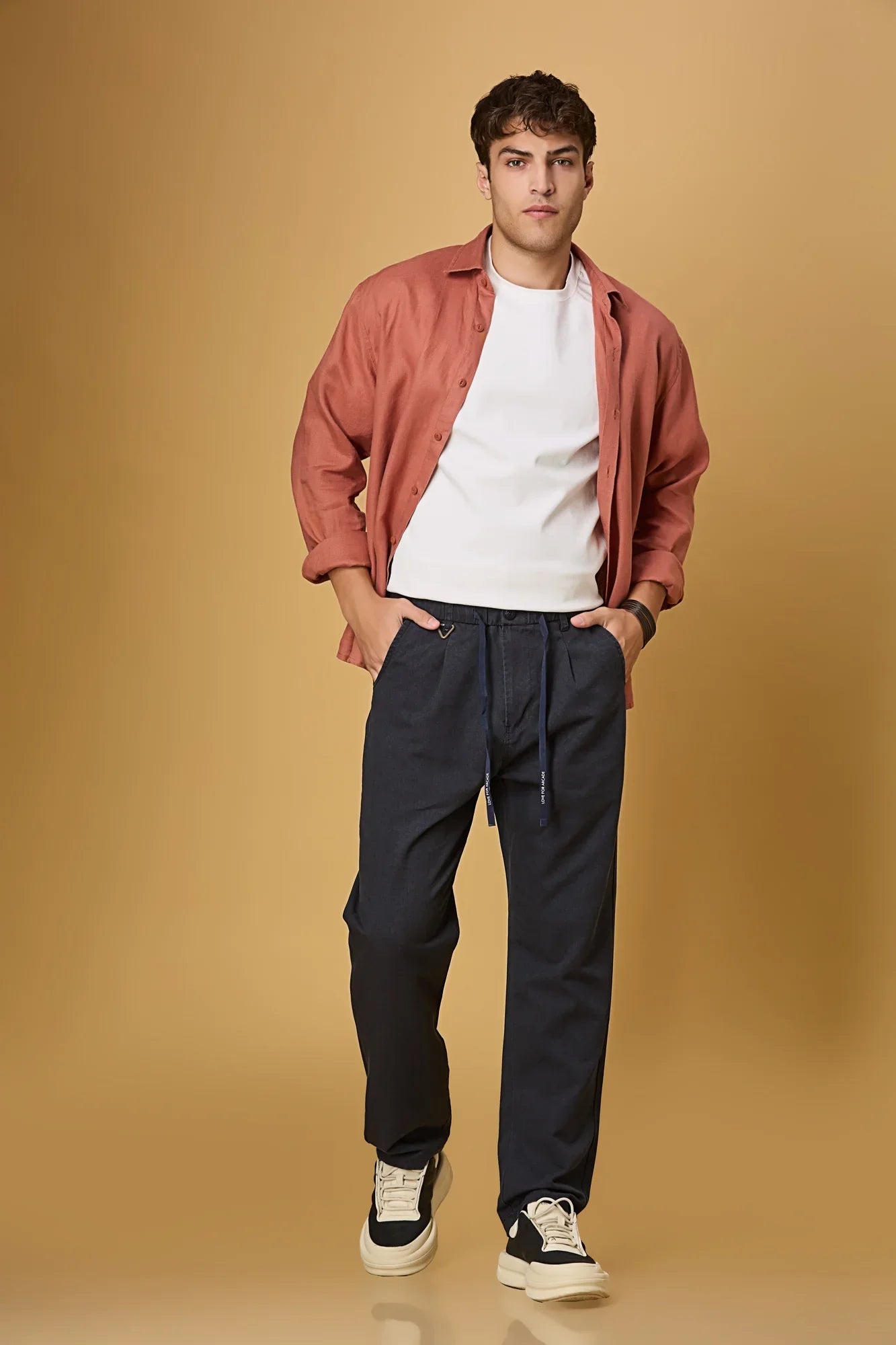 LOFA navy blue Tencel-cotton trousers styled for men – comfort fit and casual elegance.