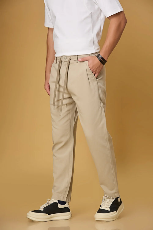 Light khaki trousers side view showing comfort fit and adjustable waist.