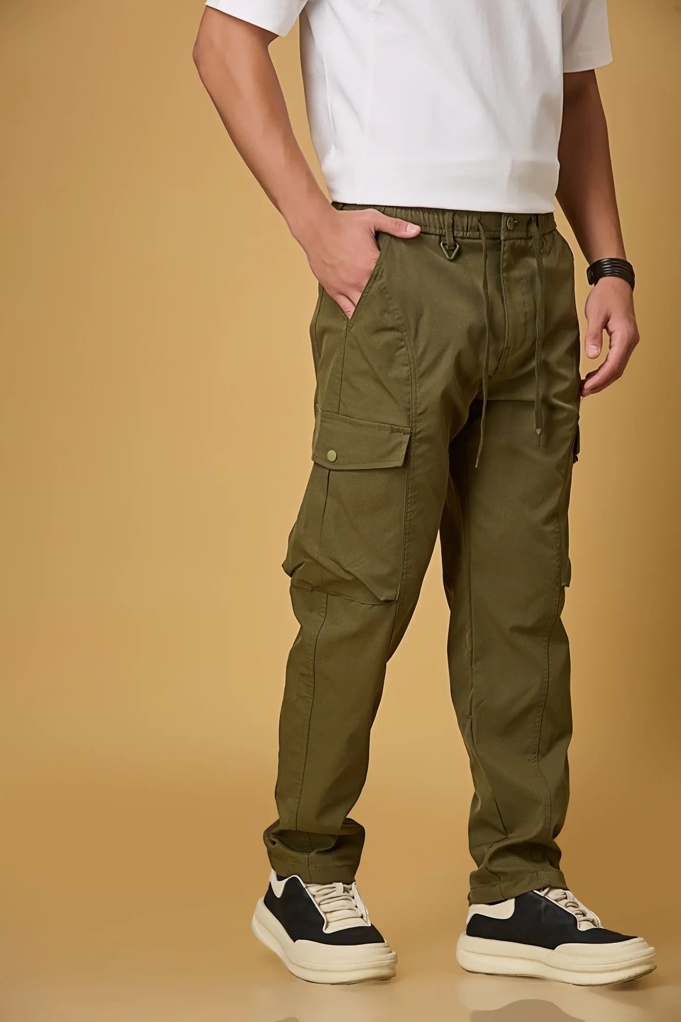 Coffee Mehndi Green pants side view showing double cargo pockets and relaxed fit.