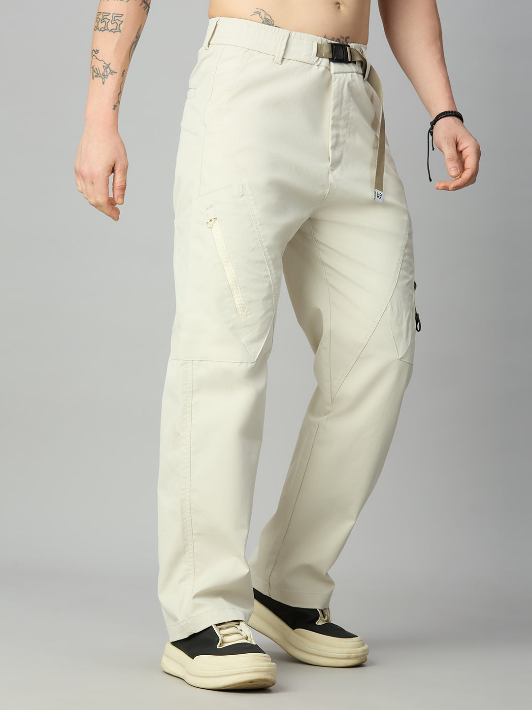Men's premium Tencel cargo pants featuring utility pockets and relaxed baggy fit – left side view