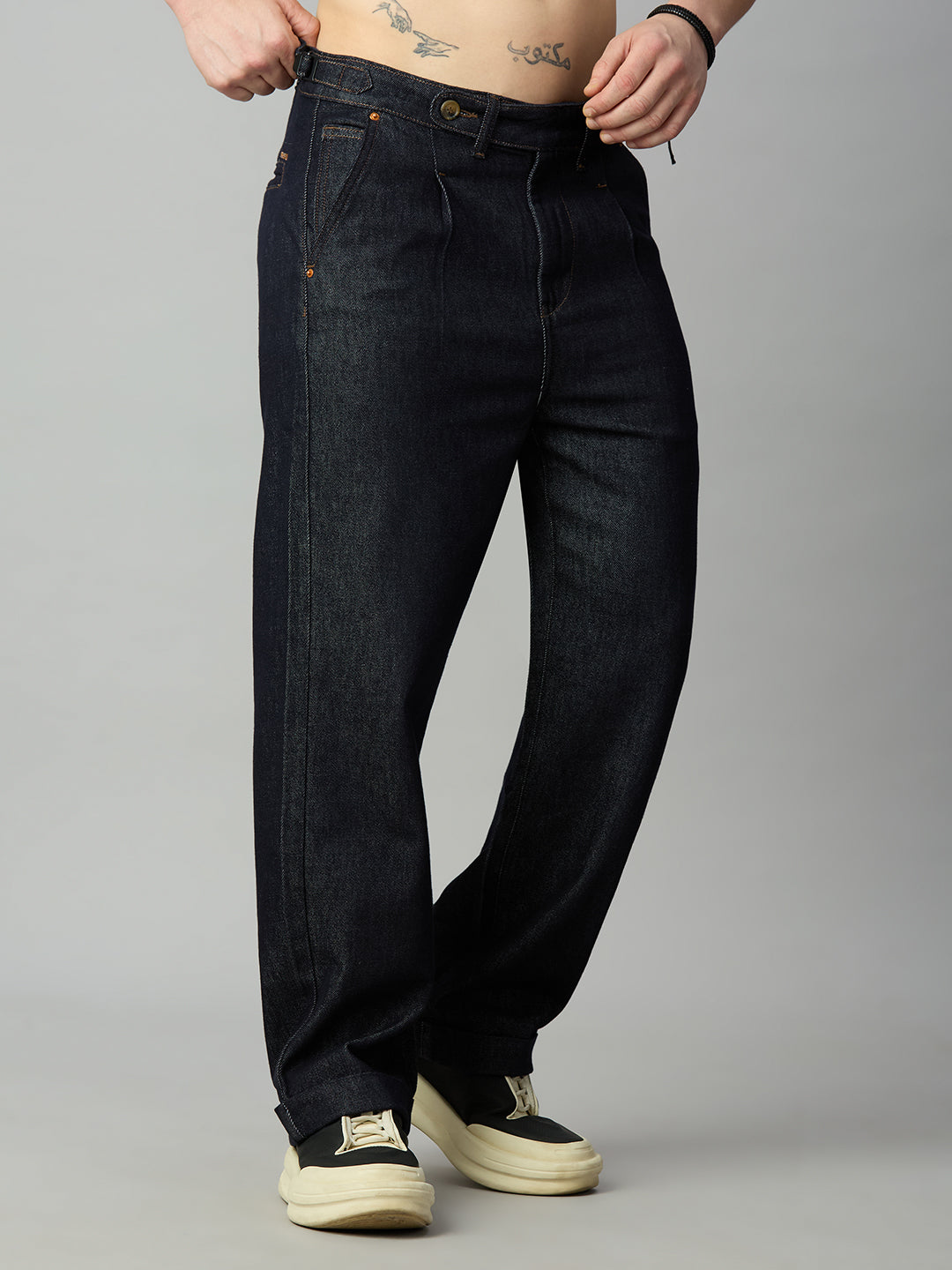 Premium deep blue baggy jeans for men with adjustable side waist tabs – left side view