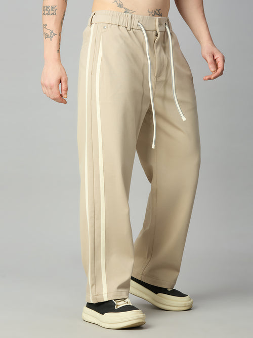 Men's relaxed fit cotton-Tencel smart pants with contrast side stripes – left side profile