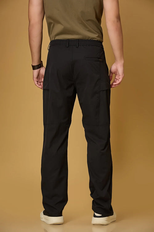 Men’s black casual pants back view – polyester stretch fabric comfort fit.