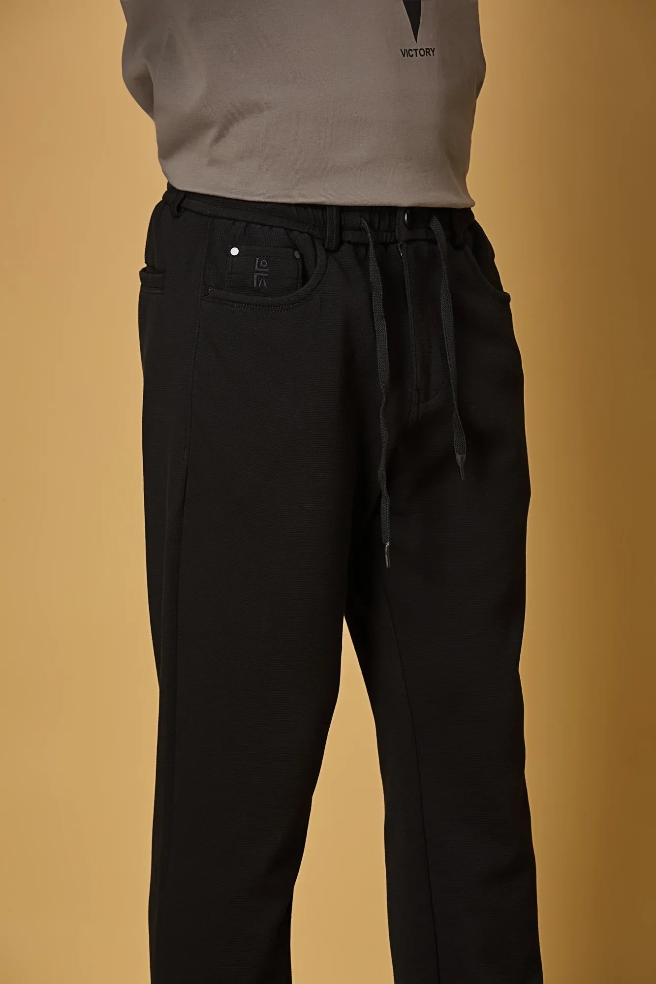 Waist String & Fabric Texture Detail on LOFA Men’s Black 4-Way Stretch Trousers