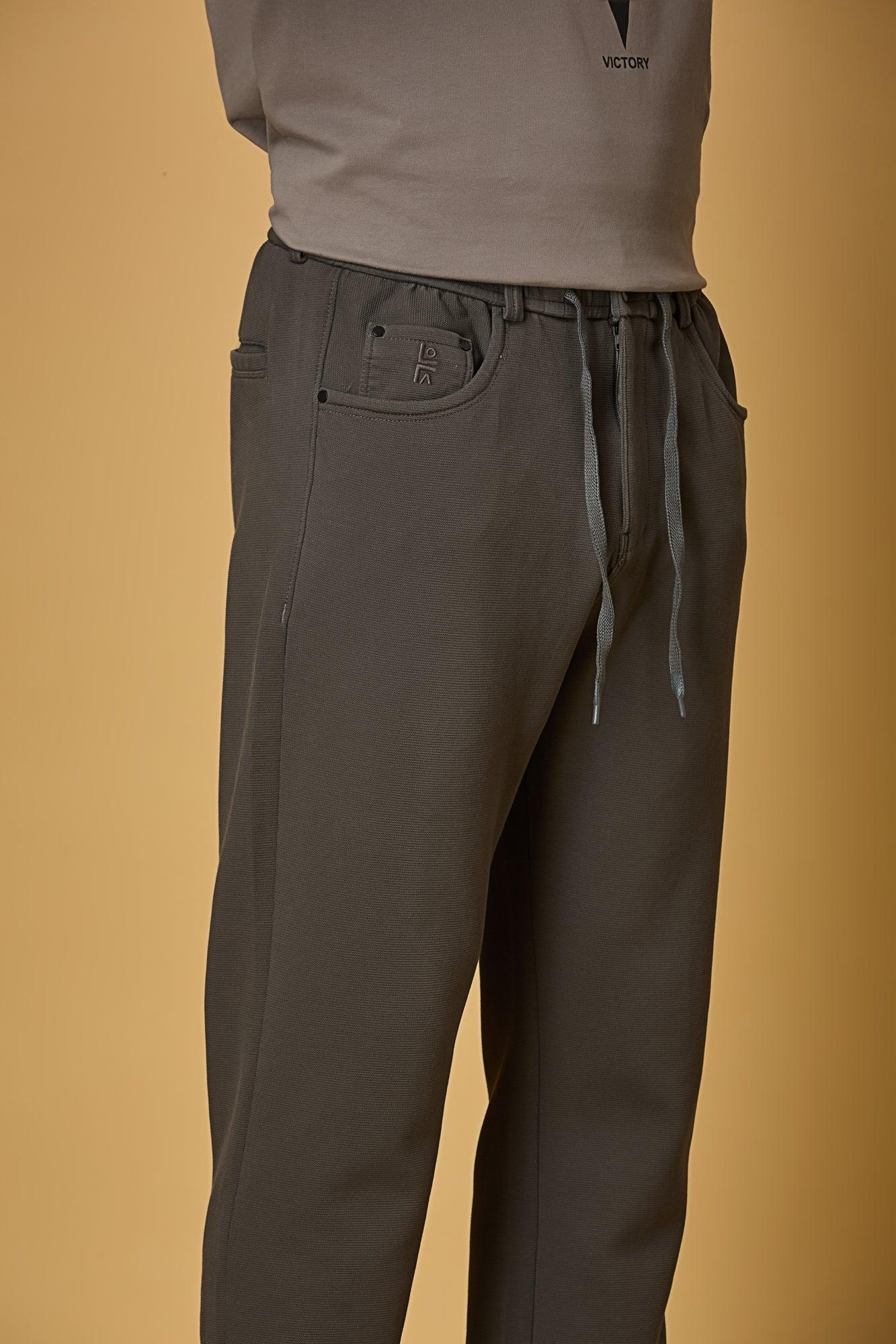 Waist String & Fabric Texture Detail on LOFA Men’s grey 4-Way Stretch Trousers