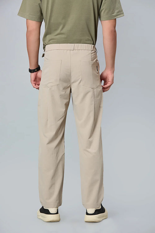 Men’s khaki formal trousers back view – 100% polyester with elastic waist.