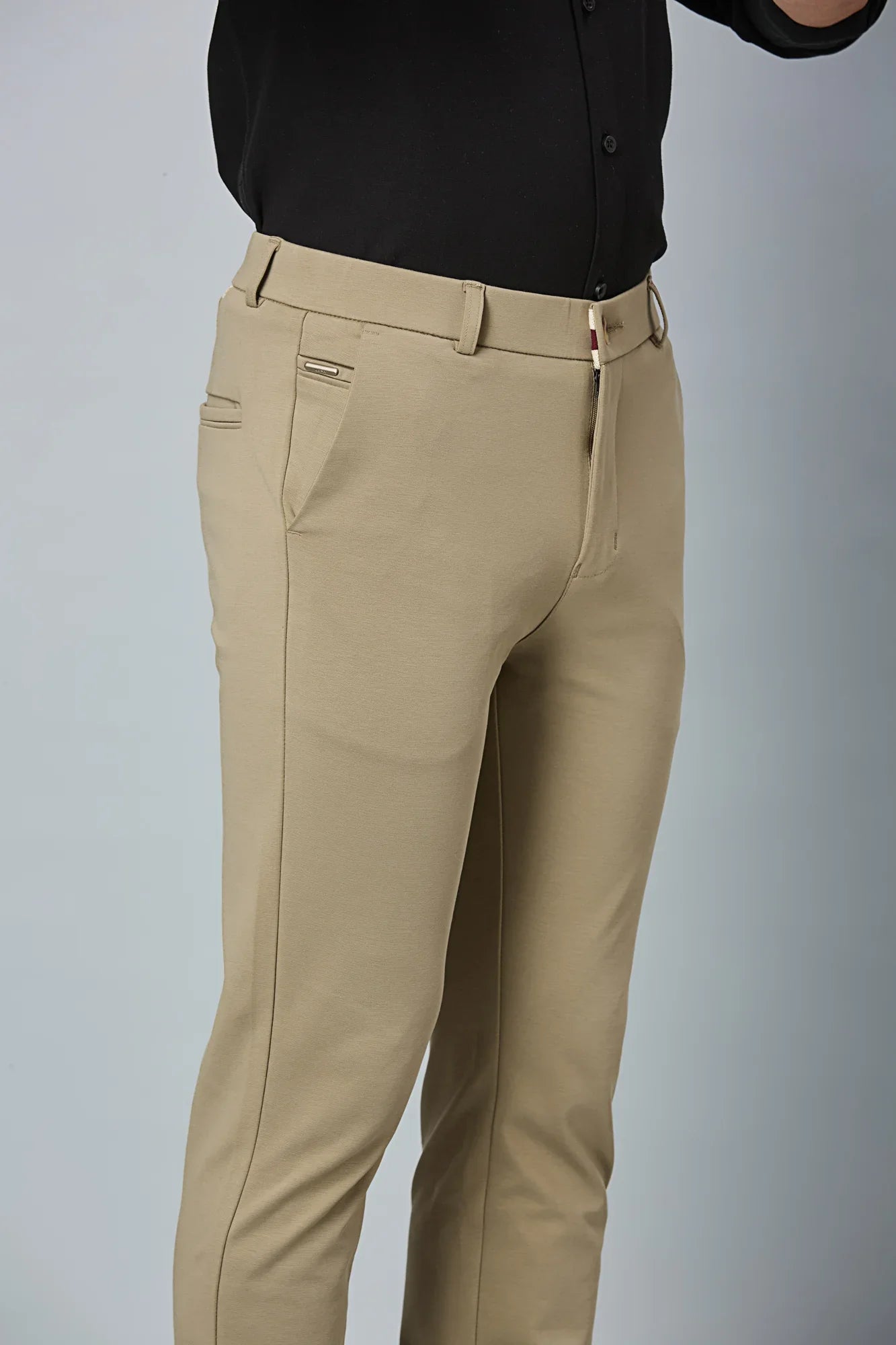 Close-up of cotton–polyester–spandex fabric showing fine stitching and smooth stretch texture of LOFA khaki formal trousers.