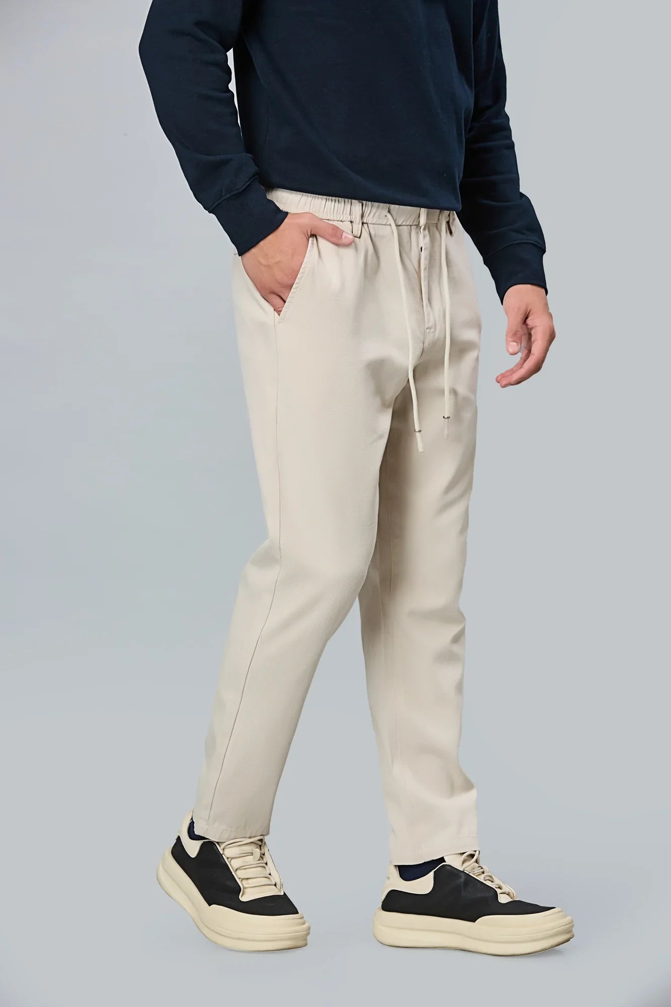 Side View of beige Comfort Fit Trousers with Waist Strings – LOFA