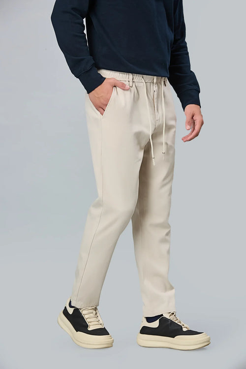 Side View of beige Comfort Fit Trousers with Waist Strings – LOFA