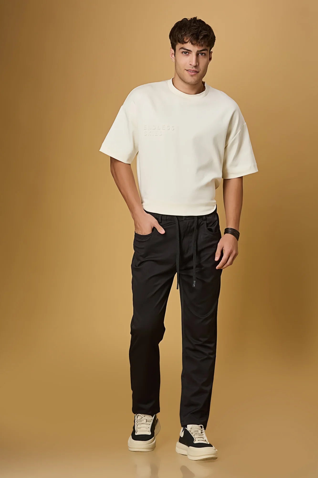 black stretchable trousers side view showing casual comfort fit.