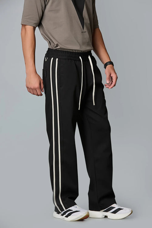 Side View of LOFA Men’s Black Baggy Fit Active Pants with Waist Strings