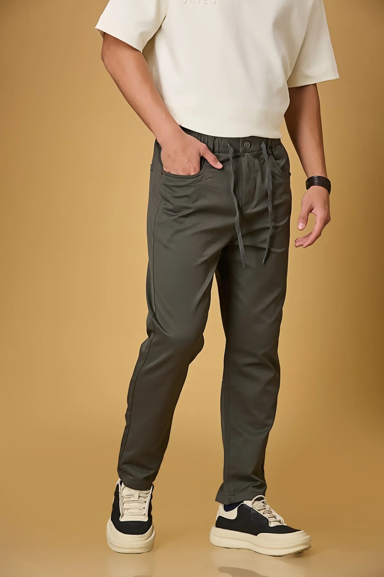 grey stretchable trousers side view showing casual comfort fit.
