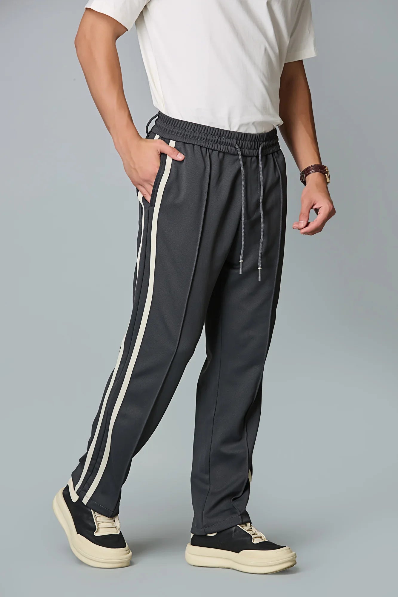 Side view of men’s grey straight-fit active trousers – LOFA lightweight stretchable pants for casual and active wear.